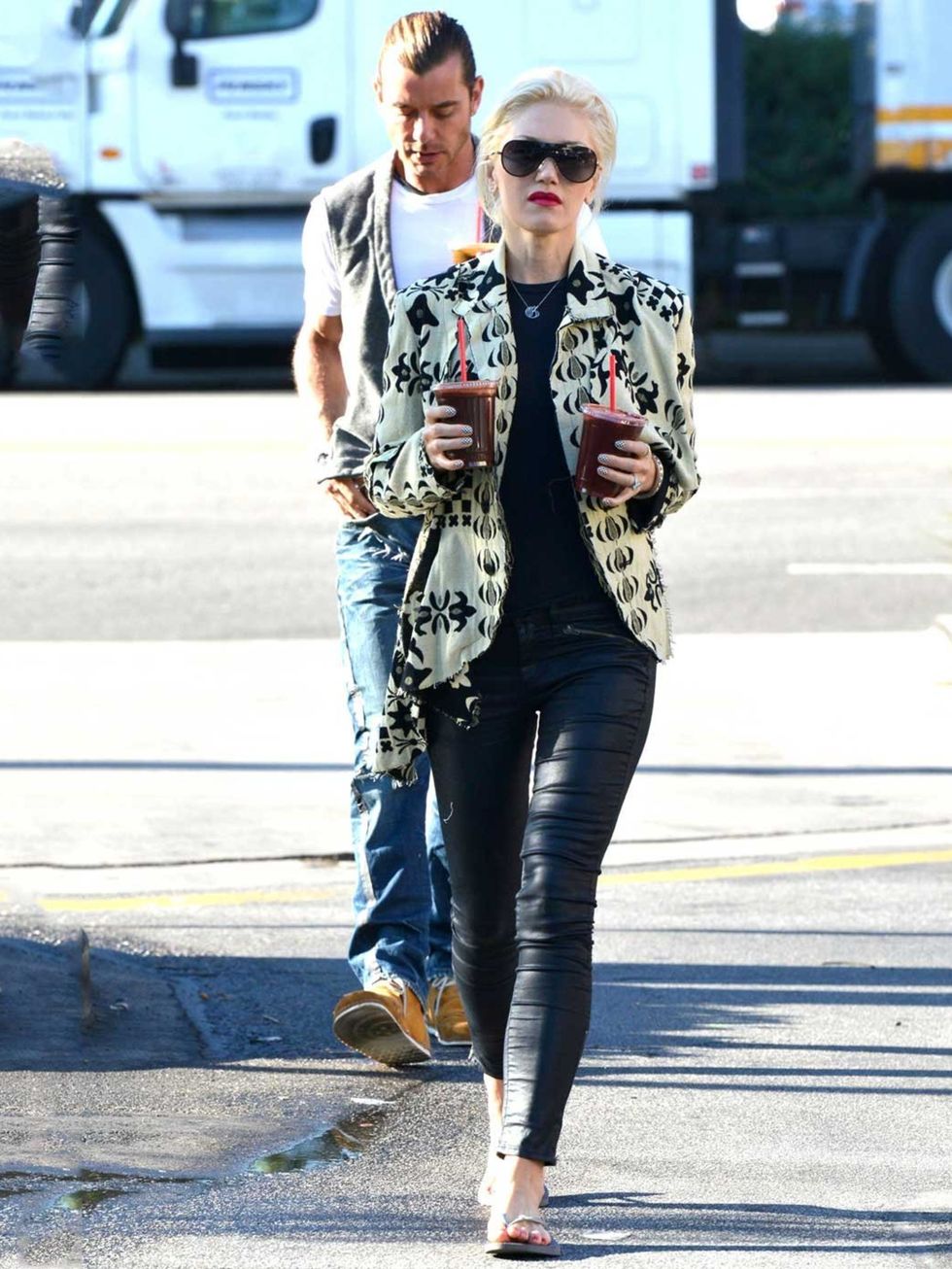 <p>Gwen Stefani out and about in Hollywood wearing a printed jacket, black tee and black trousers. </p>