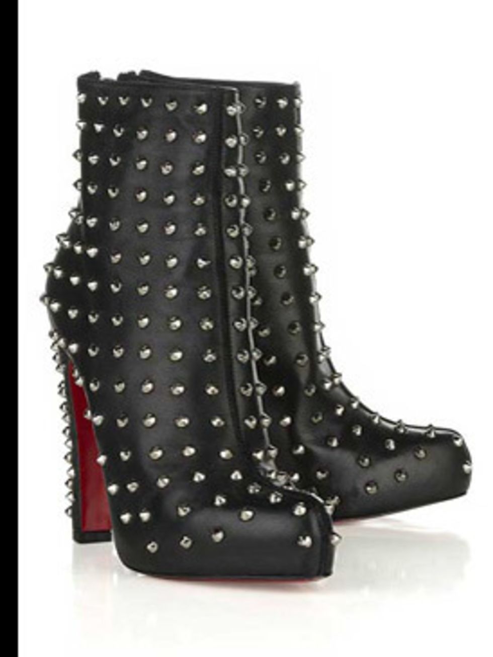<p>Ariella black leather studded boots, £585, by Christian Louboutin at (0207 245 6510)</p>