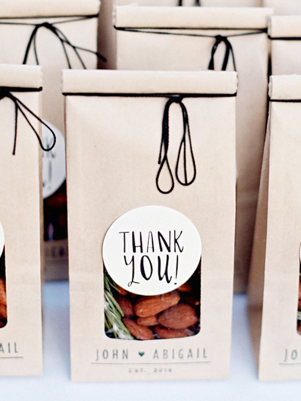 <p>Forget sugared almonds, here's a cute modern way of giving nuts to your guests - <a href="http://www.stylemepretty.com/collection/1902/picture/2500869/" target="_blank">Style Me Pretty</a></p>