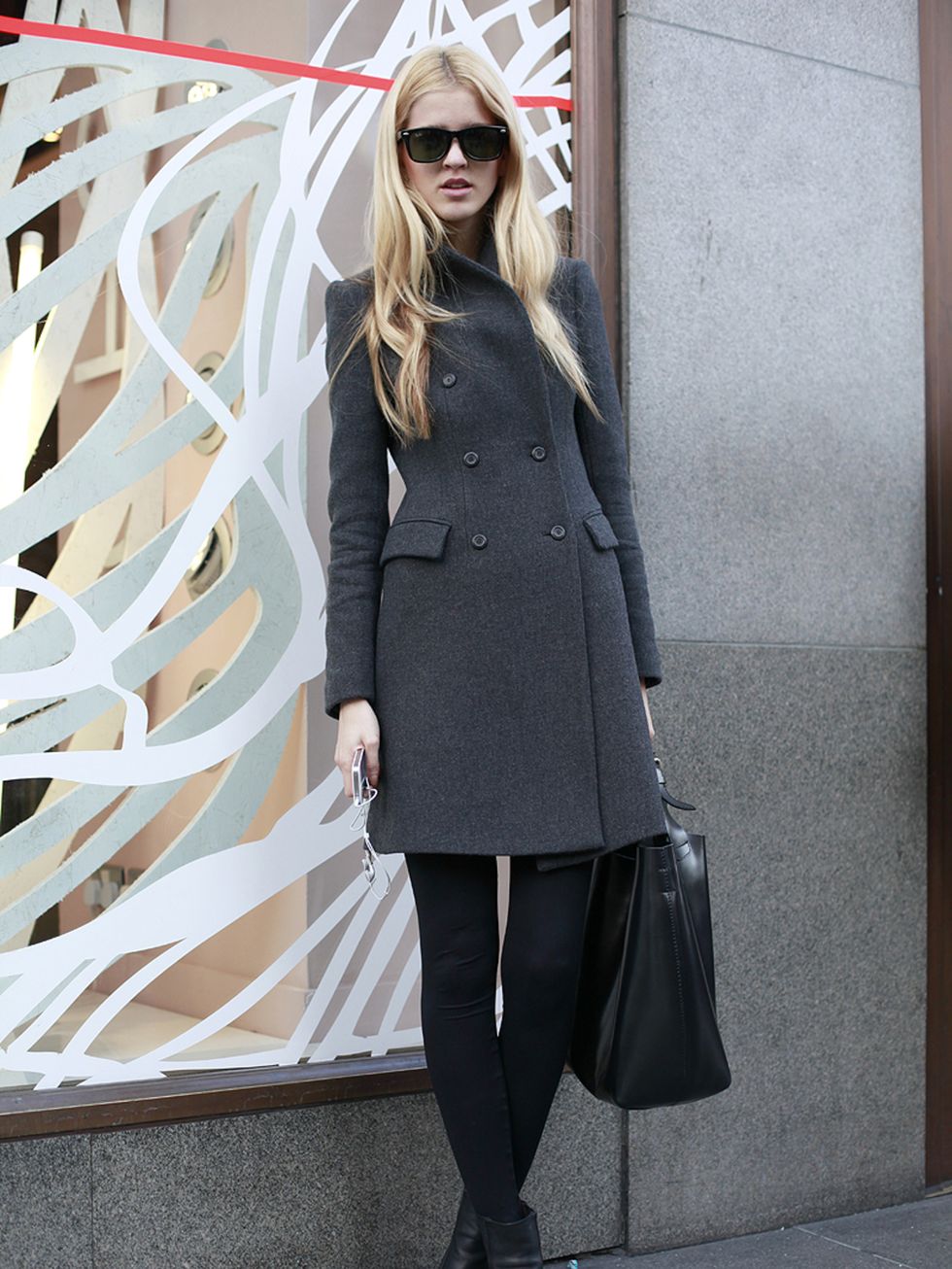 <p>Andrea, 20, model. Zara coat, boots &amp; bag, Dior sunglasses.</p>
