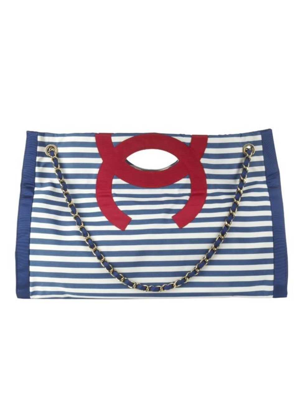 <p>Nautical tote bag, £1,380, by Chanel (0207 493 5040)</p>