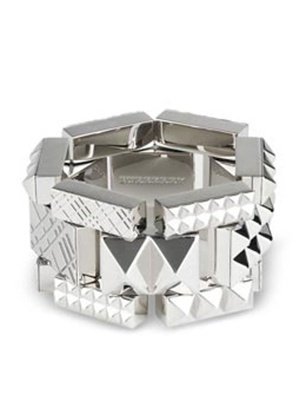 <p>Chunky silver bracelet, £395, by Burberry (0207 806 1303)</p>