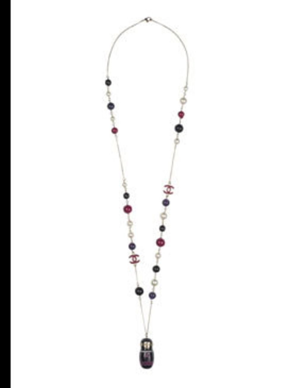 <p>Russian doll necklace, £850, by Chanel (020 7493 5040) </p>