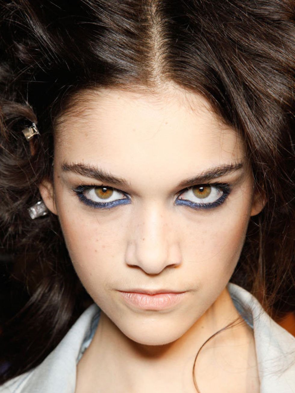<p>More shows than we can mention here sent models down the catwalks with sooty, sultry, smokey eyes. But each eye has a twist on traditional charcoal. At <a href="http://www.elleuk.com/catwalk/collections/moschino/">Moschino </a>Tom Pecheux smudged a koh