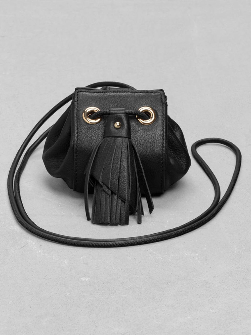 <p>Fashion Assistant Charlie Gowans-Eglinton couldn't resist a classic bag with a twist. </p>

<p><a href="http://www.stories.com/gb/Bags/Shoulder_bags/Small_Leather_Drawstring_Pouch/582764-7978970.1" target="_blank">&Other Stories</a> bucket bag, £45</p>