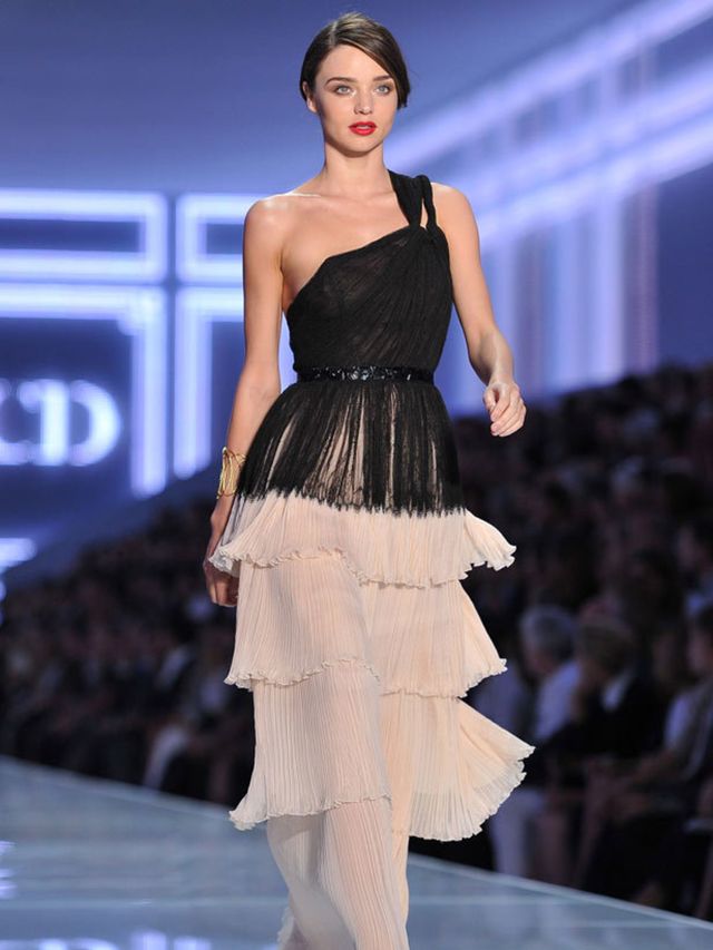 <p>Miranda Kerr walking for Dior S/S '12</p>