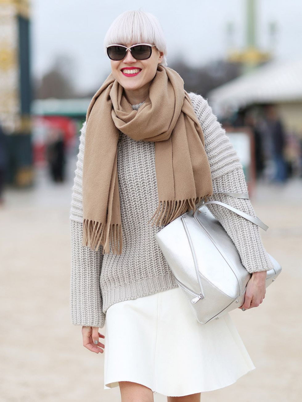 <p>Linda Tol wears Acne scarf, Balenciaga jumper, Zara skirt, LK Bennett bag</p>