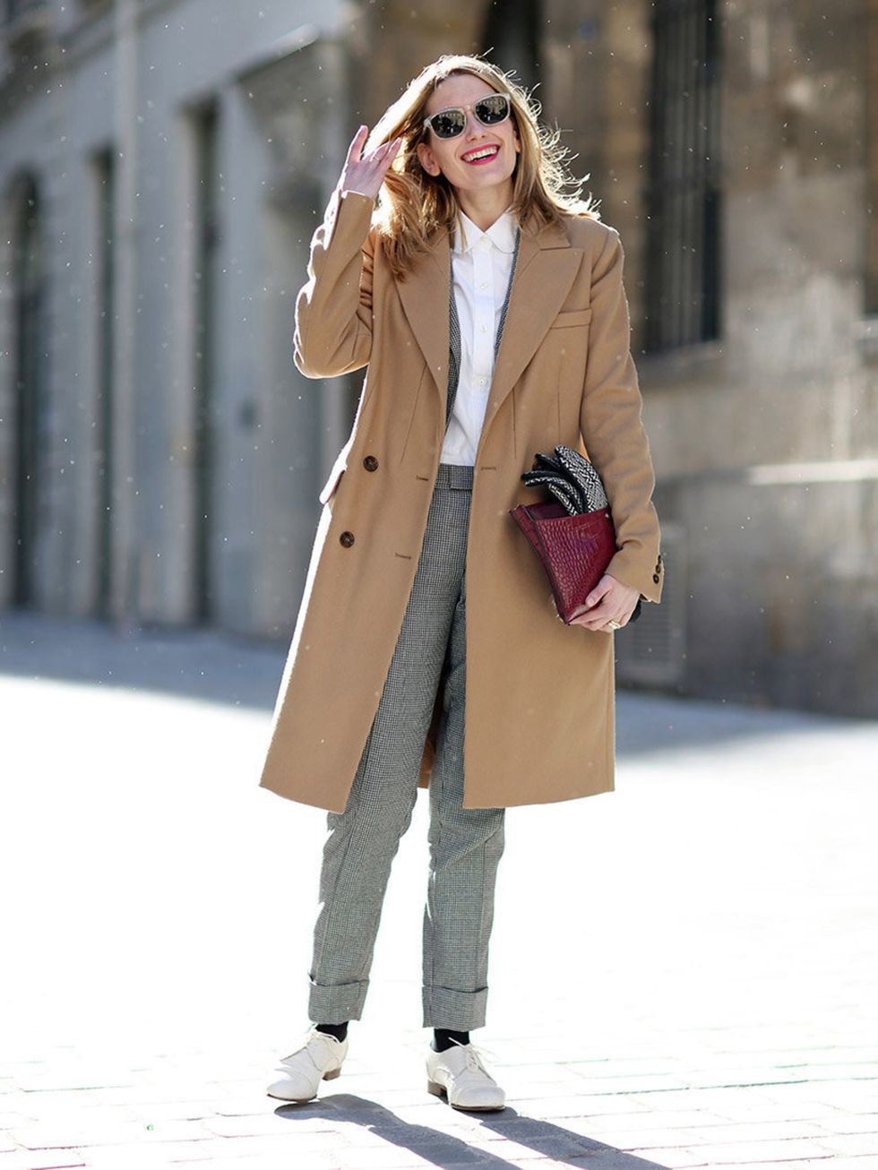 <p>Melissa Liebling Goldberg wears Carven coat, Band of Outsiders suit, Coach bag, Rag and Bone gloves, Madewell shoes</p>