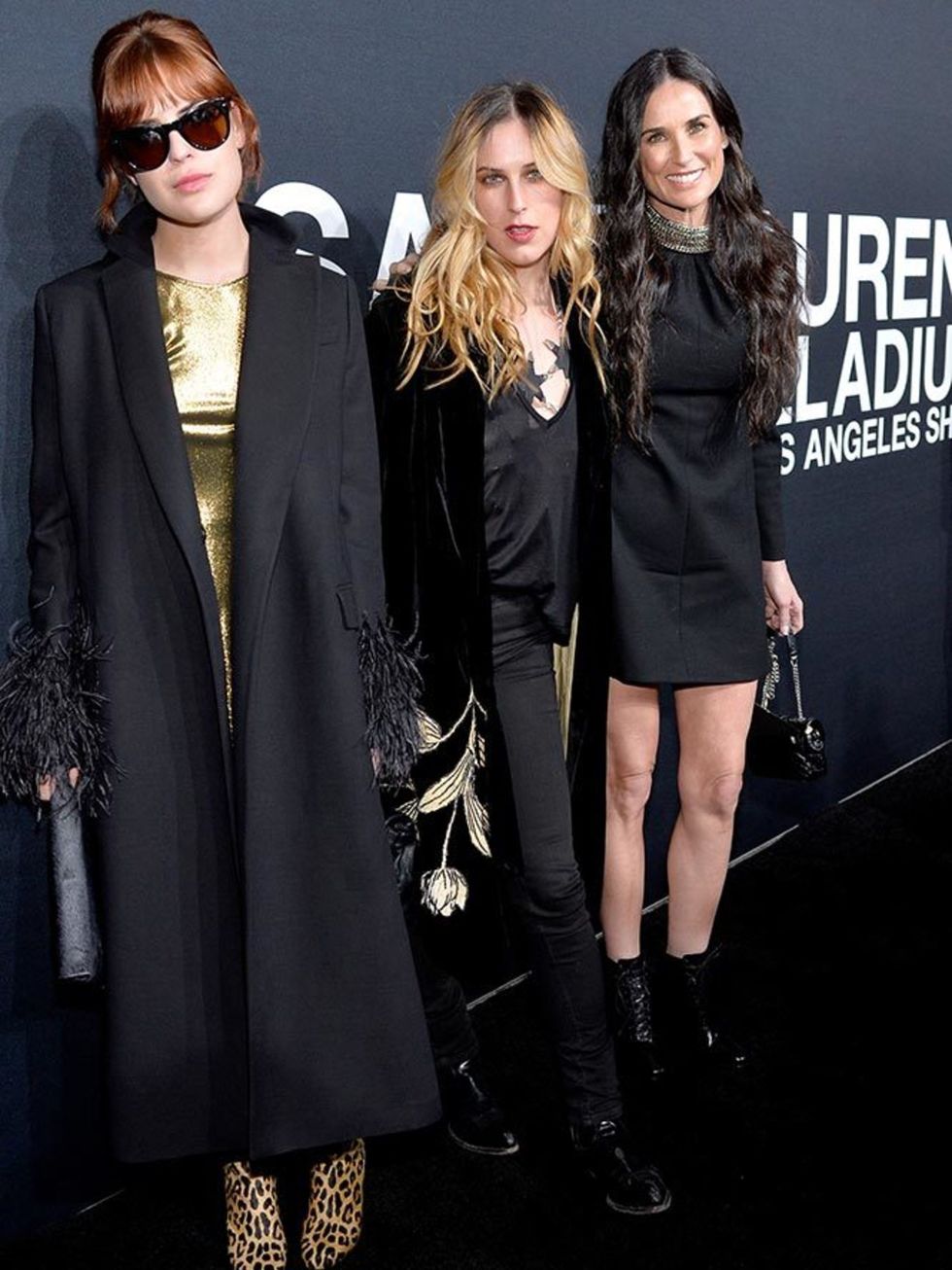 Talulah Willis, Scout Willis and Demi Moore attend the Saint Laurent at the Palladium show in LA, Februrary 2016.
