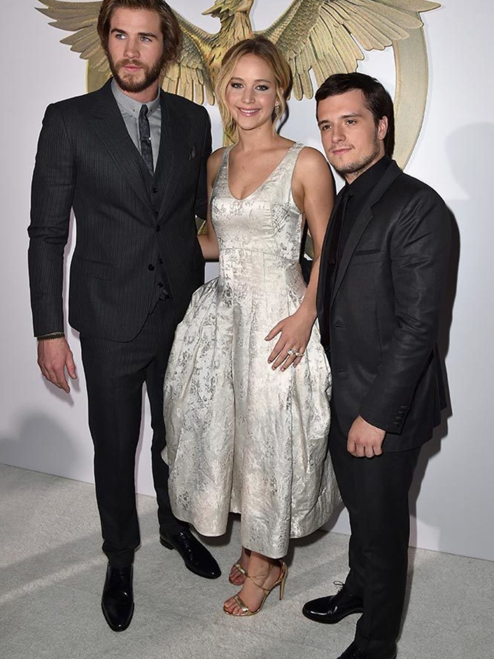 Josh Hutcherson, Jennifer Lawrence and Liam Hemsworth at The Hunger Games: Mockingjay Part 1 premiere in LA, November 2014.