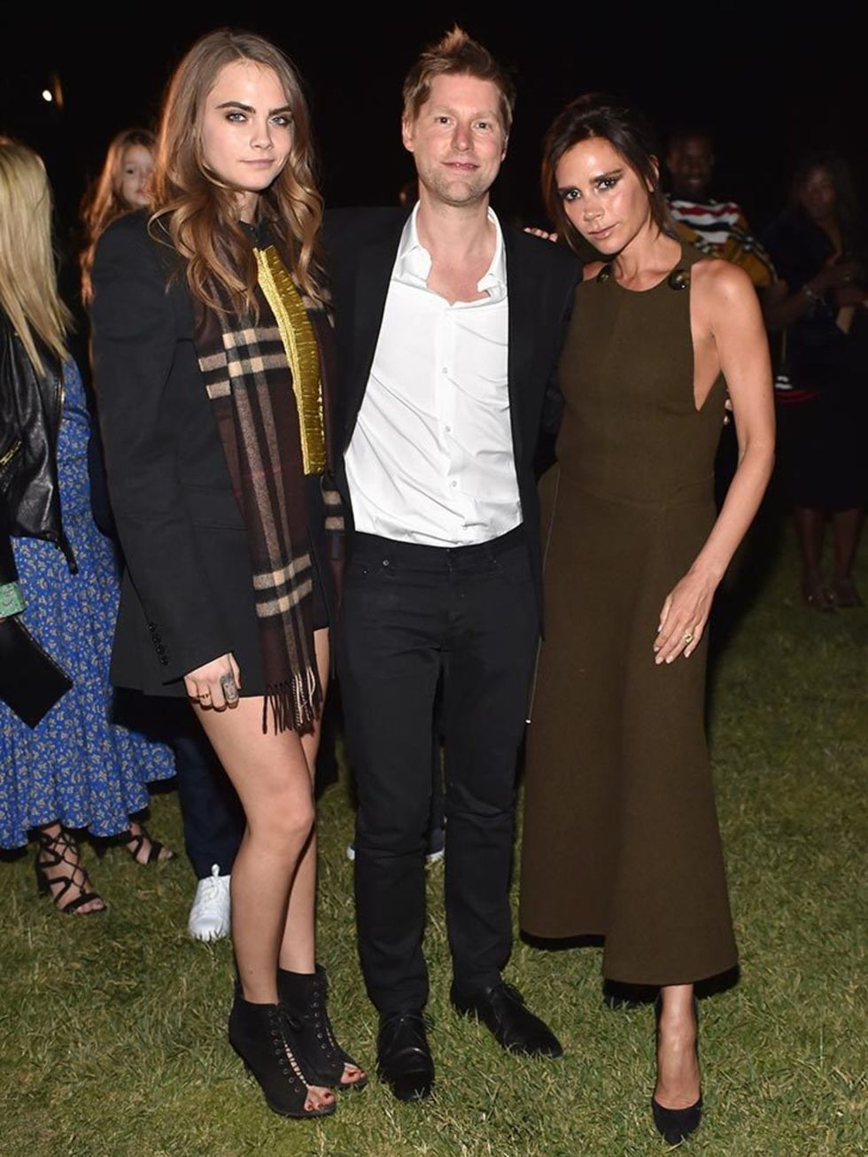 <p>Cara Delevingne, Christopher Bailery and Victoria Beckham at Burberry's 'London in Los Angeles' event, April 2015</p>