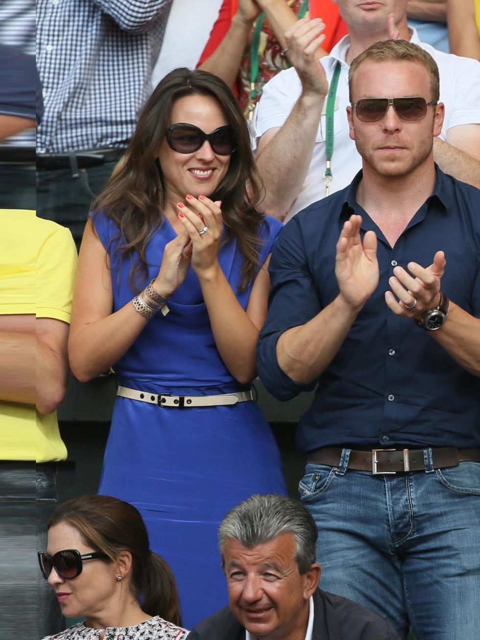 <p>Sir Chris Hoy and wife Sarra Hoy at the Men's Singles Final between Novak Djokovic and Andy Murray on Day 13 of the Wimbledon, London, July 2013.</p>