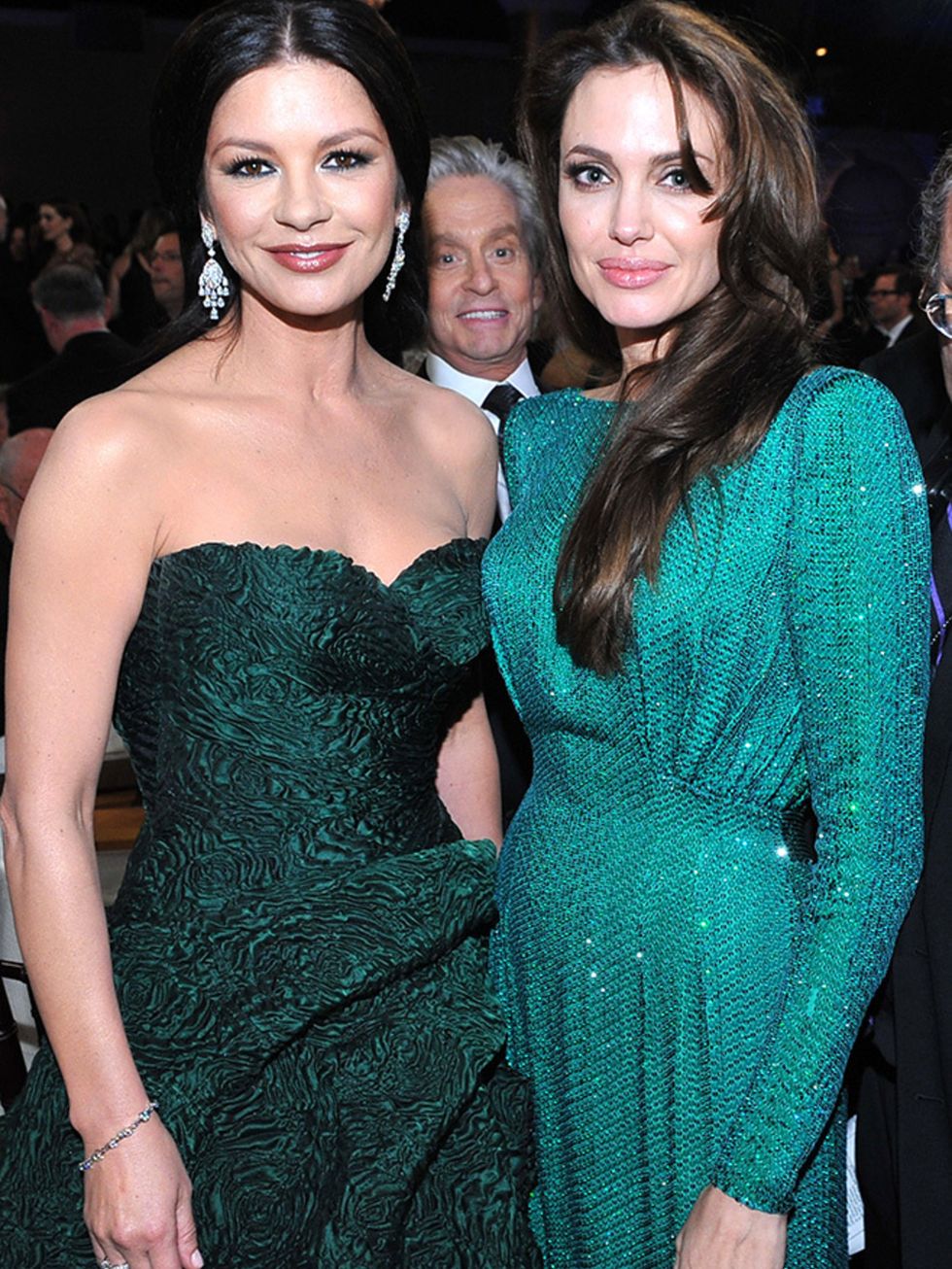 <p>Catherine Zeta-Jones poses with Angelina Jolie during the 68th Annual Golden Globe Awards, 2011.</p>