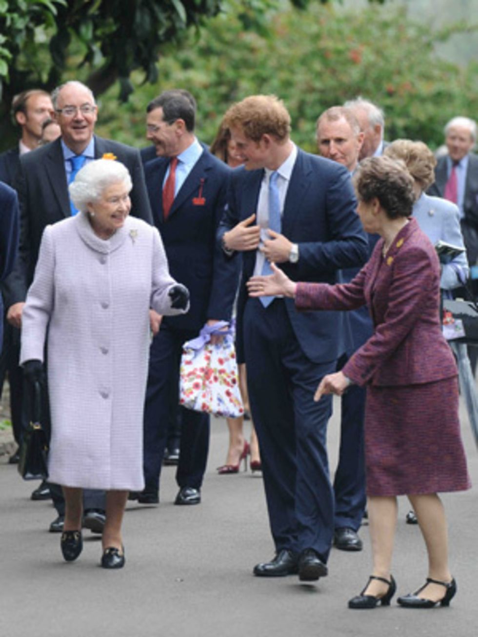 <p>The Queen and Prince Harry arrive at the 100th Chelsea Flower Show</p>