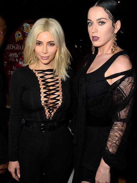 Kim Kardashian and Katy Perry at the Givenchy a/w15 show during Paris Fashion Week, March 2015.
