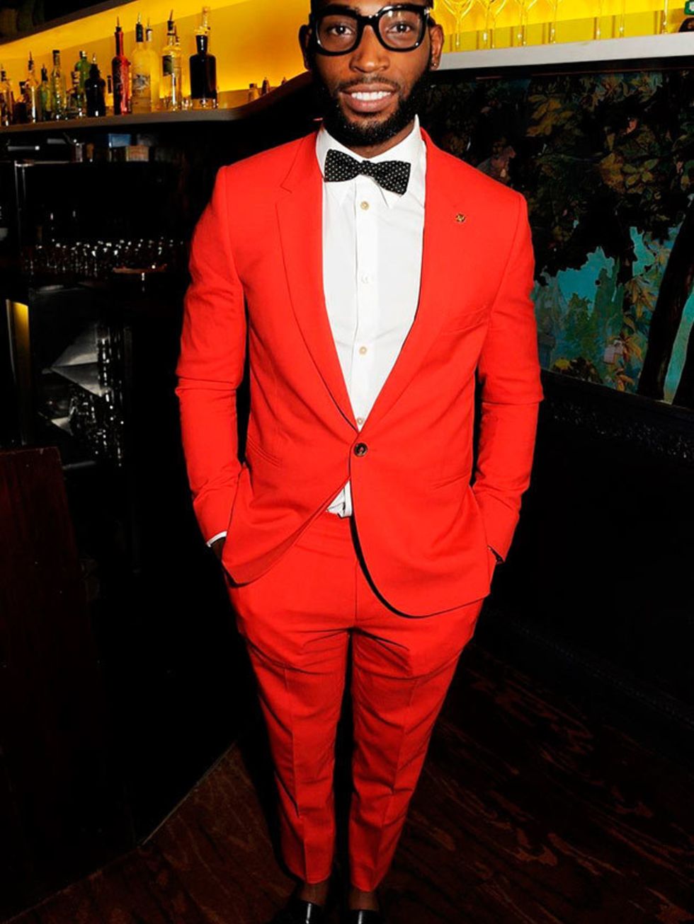 <p>Tinie Tempah hosts a private dinner with Sir Paul Smith, and GQ editor Dylan Jones to celebrate London Collections: MEN AW13 at Sketch, London, January 2013.</p>