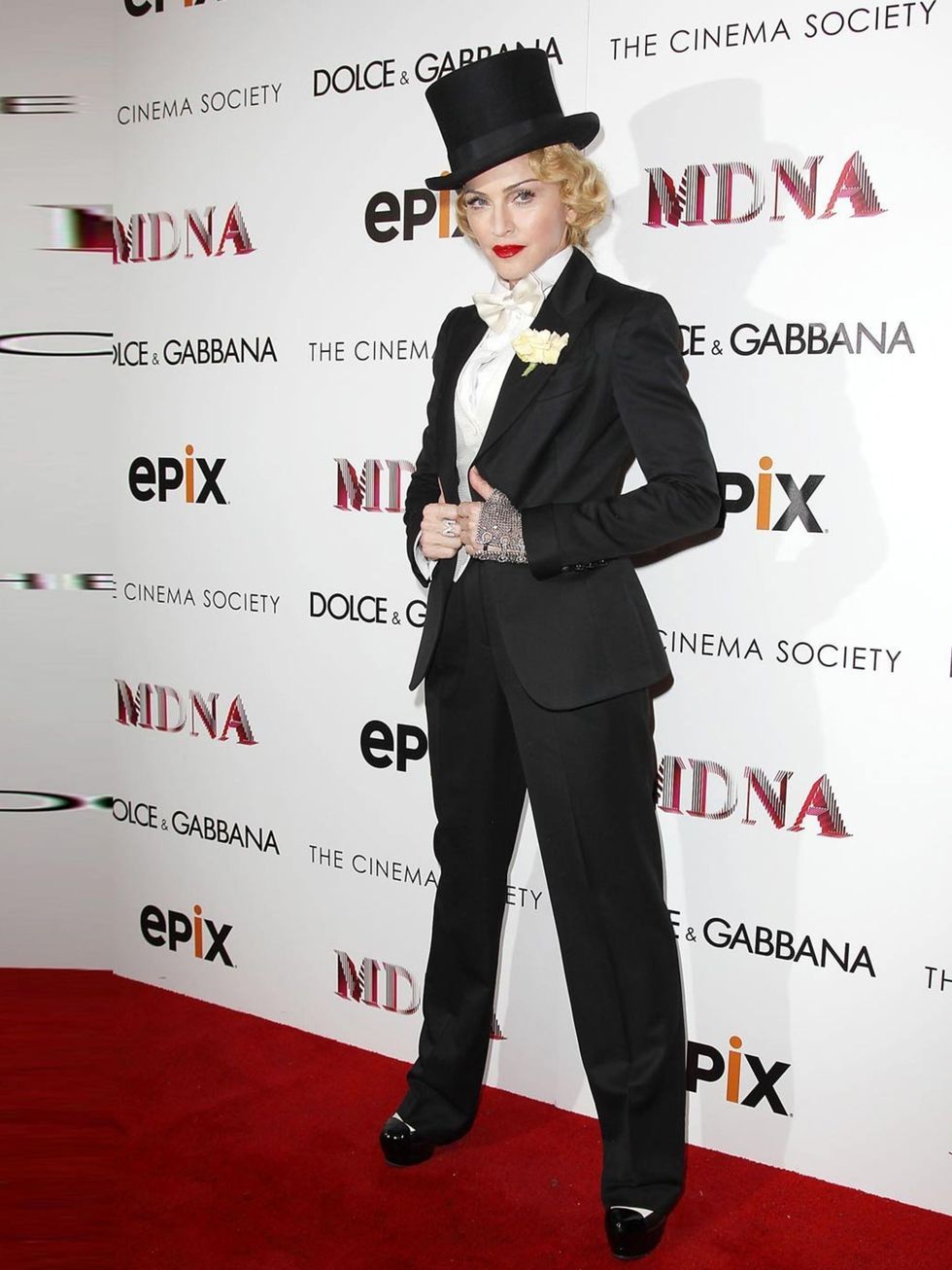 <p>Madonna wore a three piece suite by <a href="attended%20the%20Dolce%20&amp;%20Gabbana%20and%20The%20Cinema%20Society%20screening%20of%20the%20Epix%20world%20premiere%20of%20%E2%80%98Madonna%3A%20The%20MDNA%20Tour%E2%80%99%20at%20The%20Paris%20Theatre%2