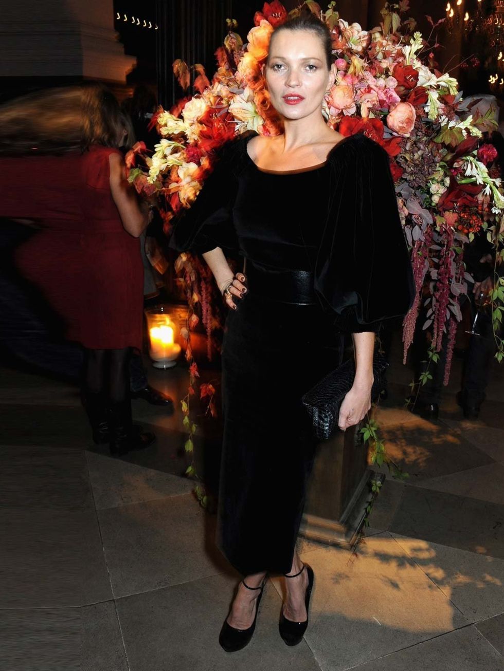 <p>Kate Moss wearing a Alexander McQueen dress with a Cathedral Arch belt from the AW13 collection to the Alexander McQueen and Frieze Dinner to celebrate the Frieze Art Fair 2013..</p>