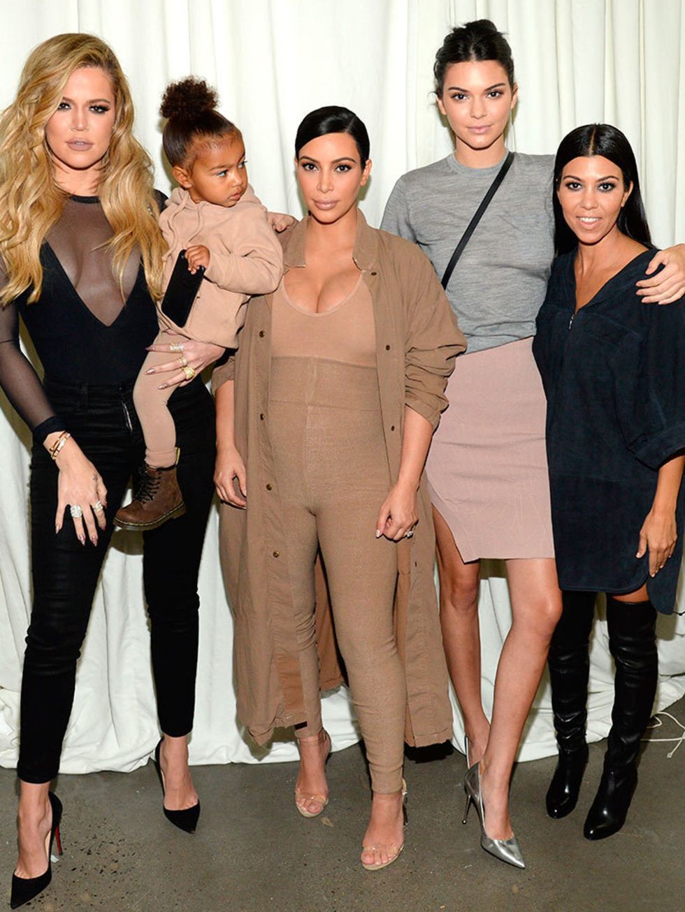 Khloe Kardashian, North West, Kim Kardashian, Kendall Jenner and Kourtney Kardashian attend the Kanye West Yeezy Season 2 show during s/s 16 NYFW.