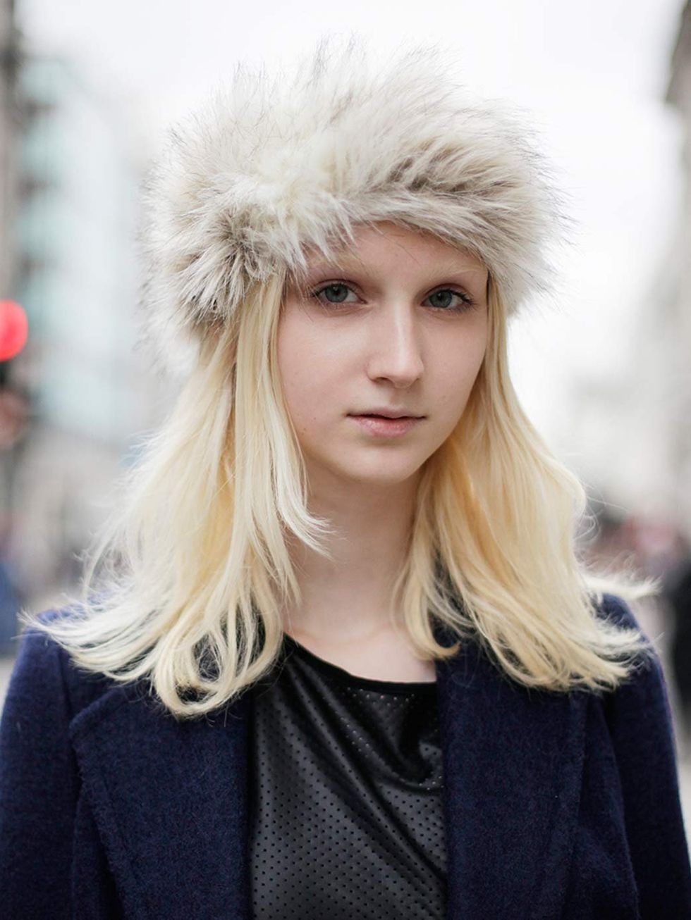 <p>Iris, 18, Model. Primark top and coat, New Look hat.</p>