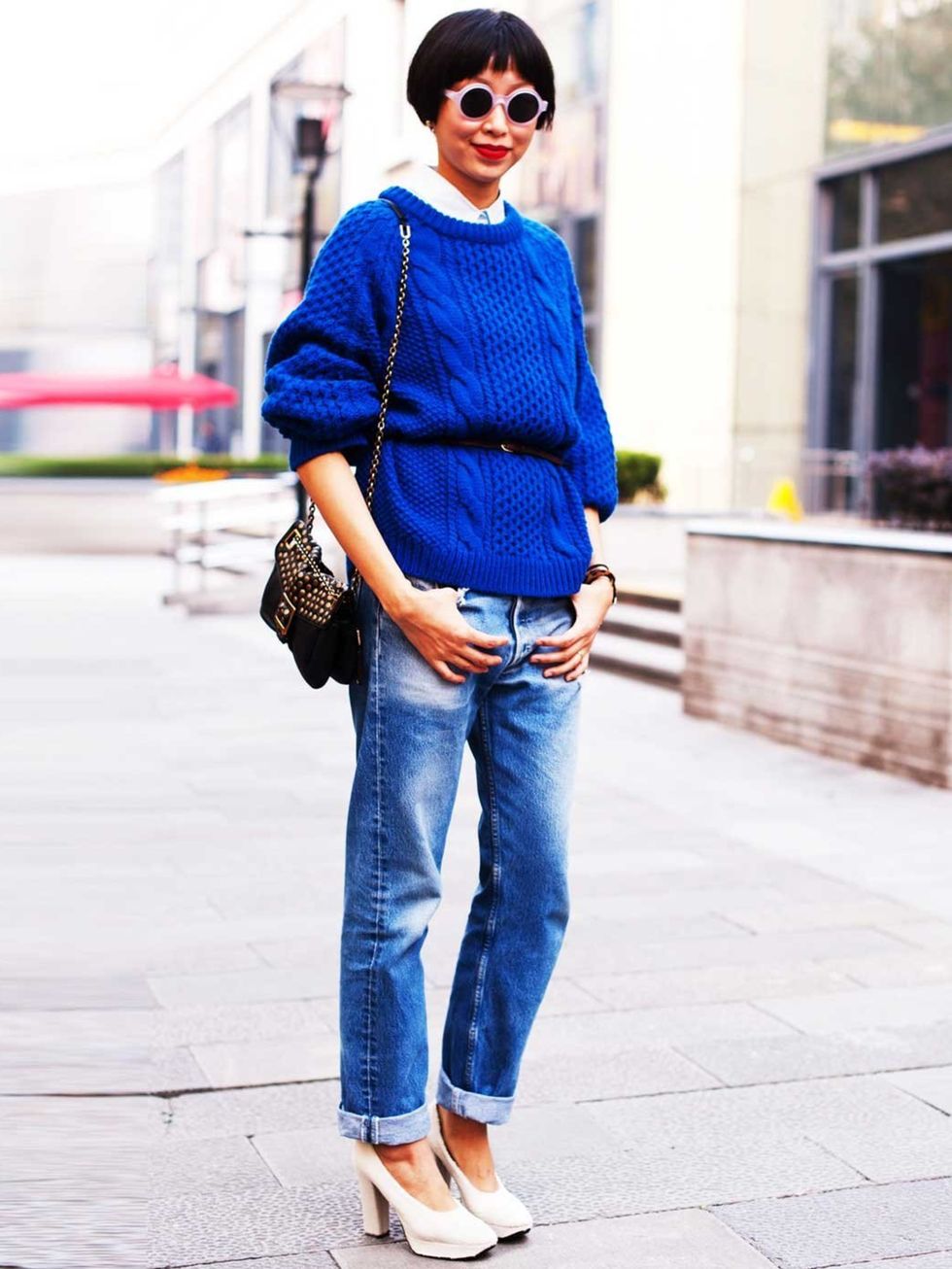 <p>Looking casually chic in a chunky knit over a pair of boyfriend jeans, China.</p>