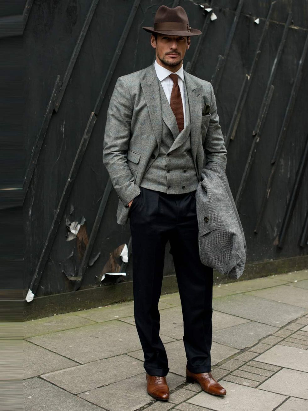 <p>David Gandy, Model. GB M and S coat, Neil Fennel October House Tailor suit, Thomas Pink shirt, Russell & Bromley shoes, Goorin Brothers hat, Reiss tie.</p>