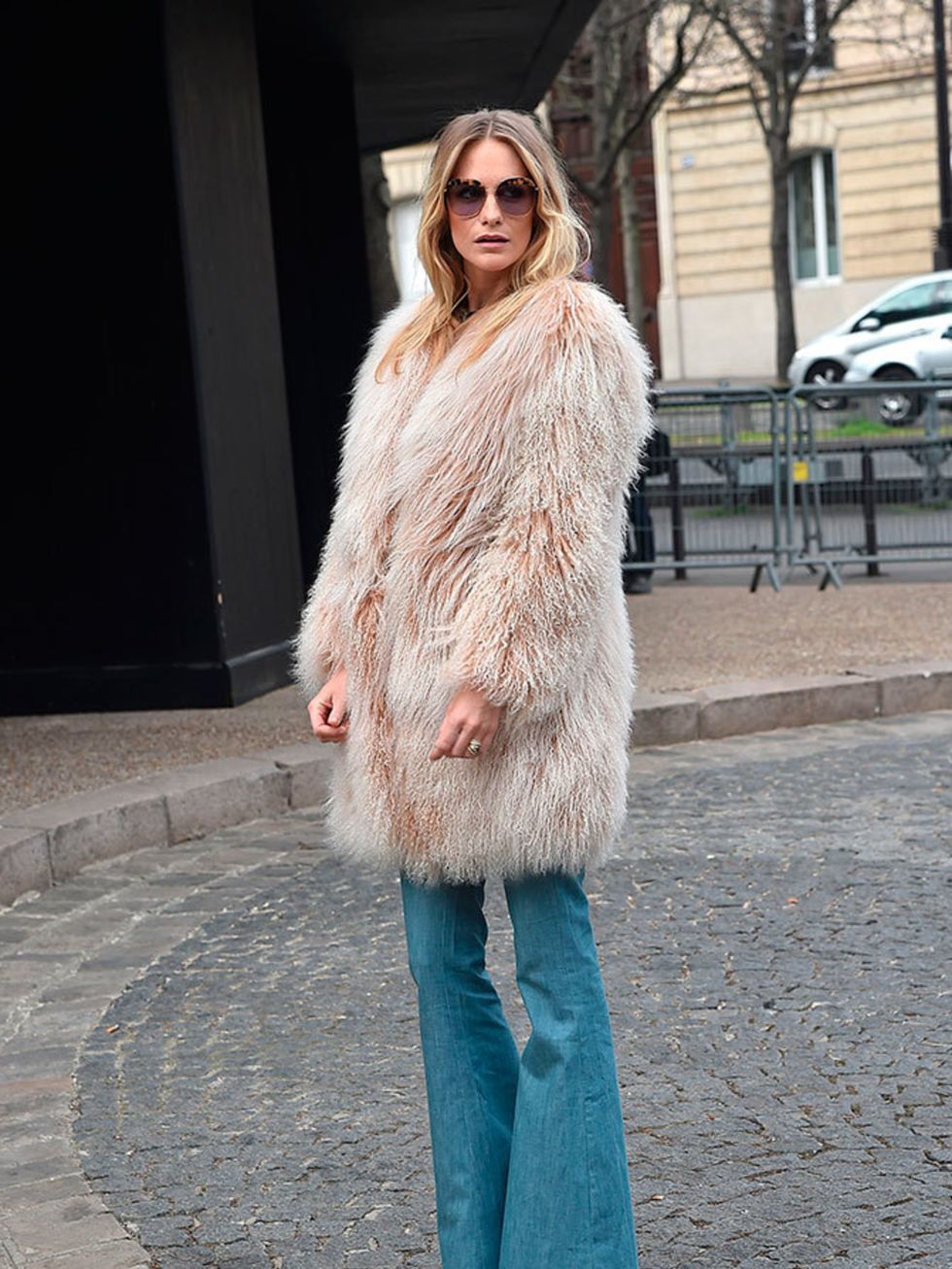 <p>Poppy Delevingne arrives for the Miu Miu a/w15 show during Paris Fashion Week, March 2015.</p>