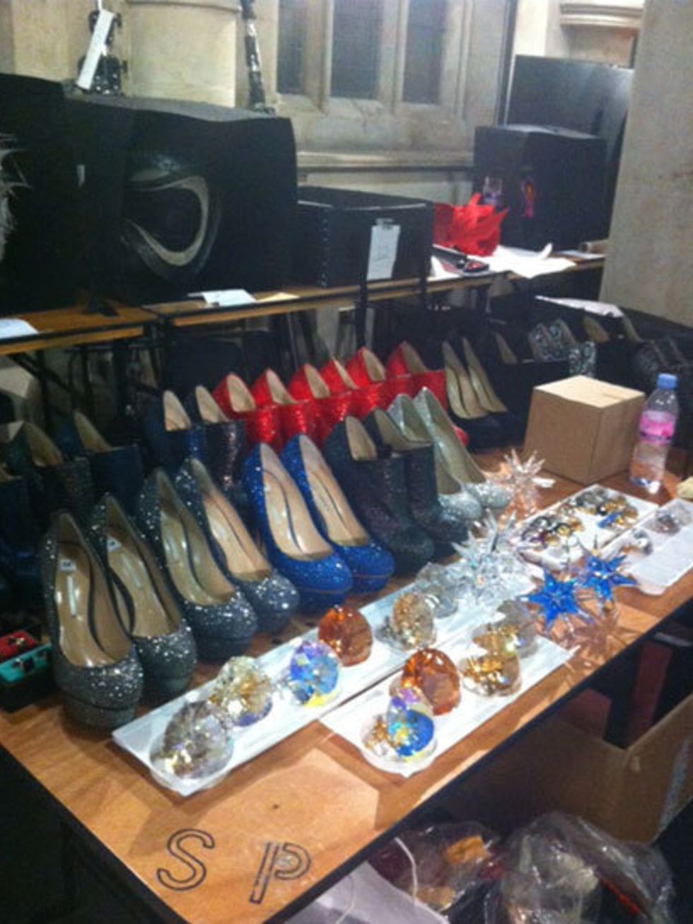 <p>Nicholas Kirkwood shoes, plus jewellery backstage at Philip Treacy spring summer 2013</p>