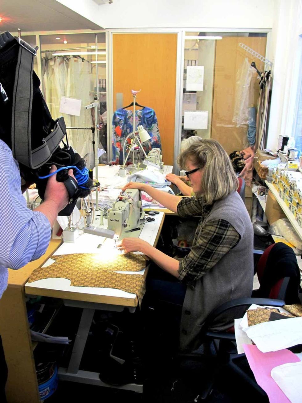 <p>'Our amazing seamstresses hard at work and being filmed by a TV crew'</p>