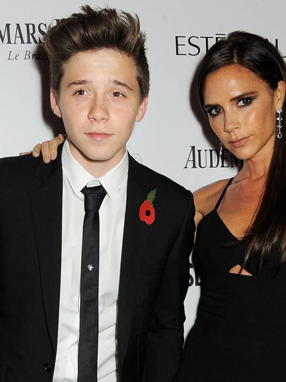 Brooklyn with his mum, Victoria, at the Harper's Bazaar Women of the Year Awards 2013