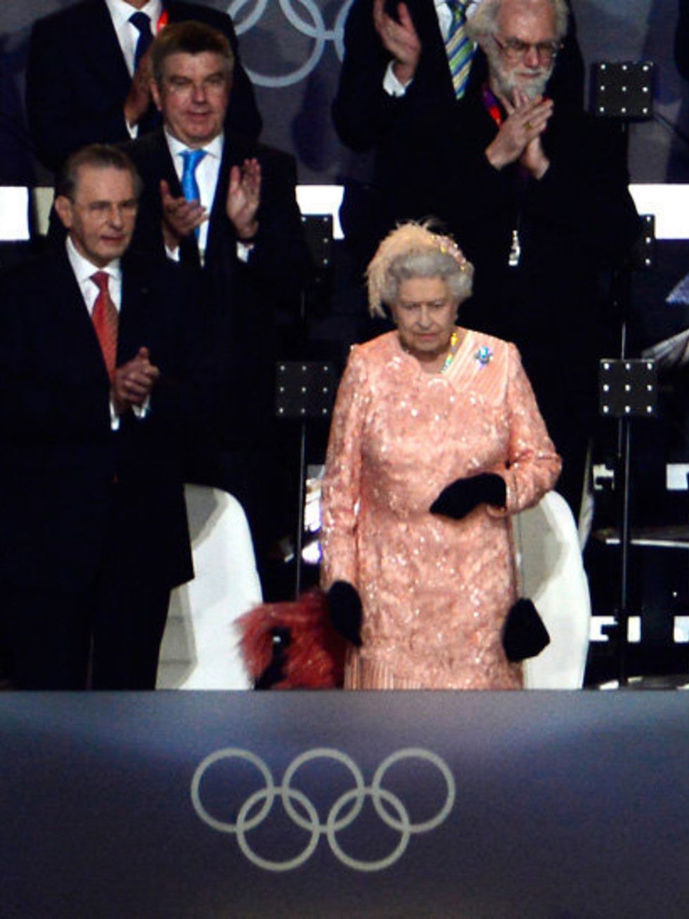 <p>HRH Queen Elizabeth II arrives at the Olympic Opening Ceremony in London. Having played a Bond Girl to the joy of the nation.</p>