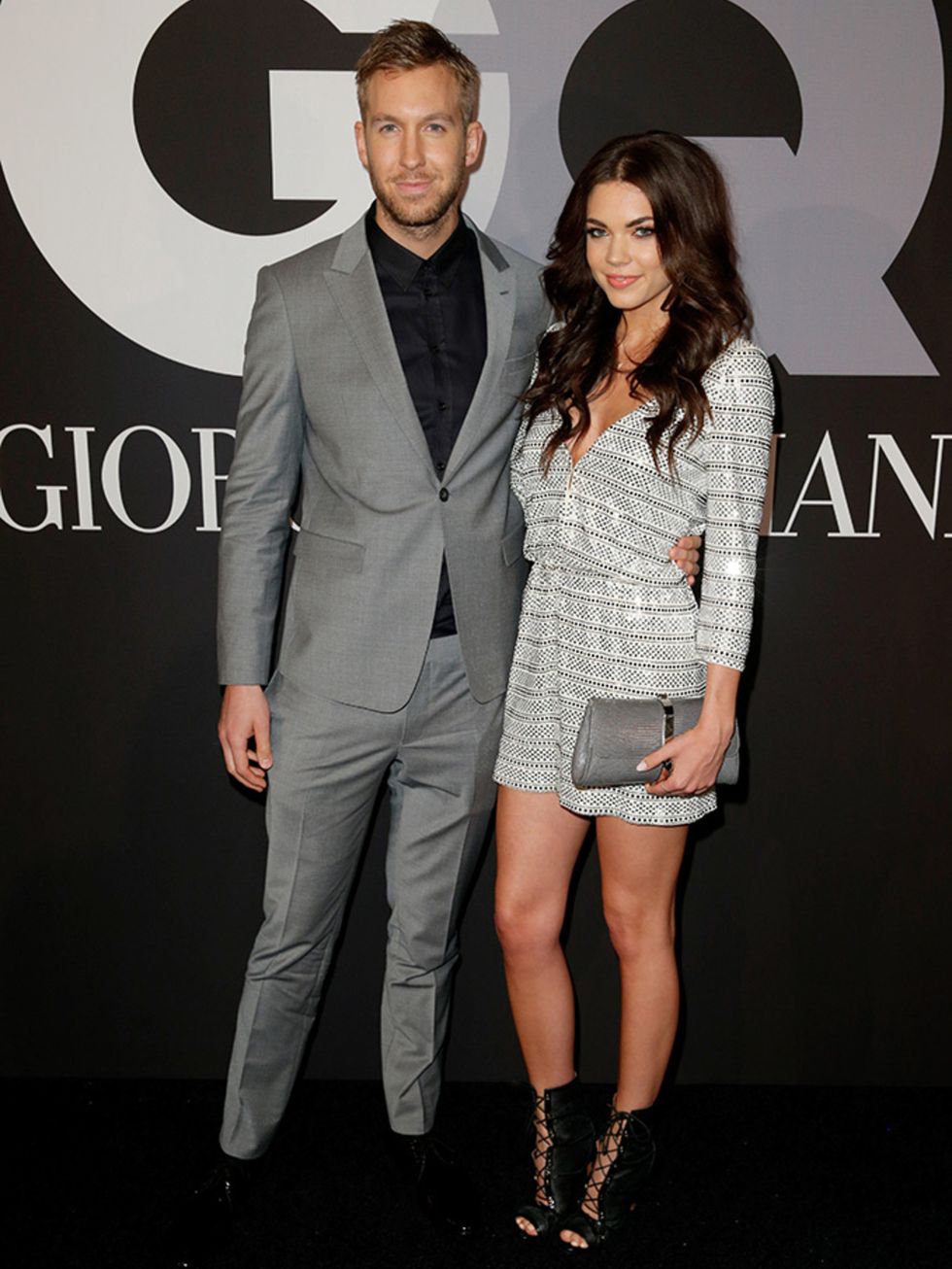 Calvin Harris and Aarika Wolf attend GQ And Giorgio Armani's Grammys After Party, February 2015.