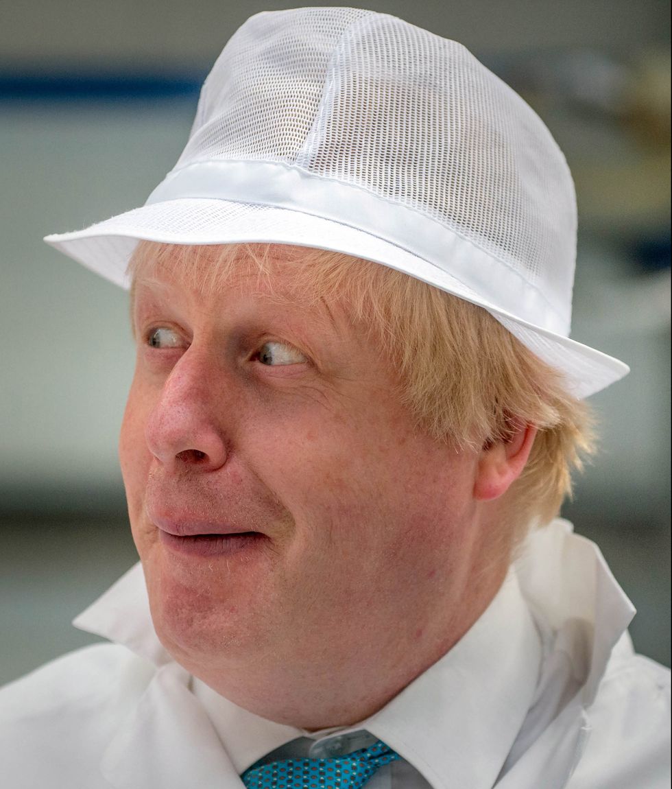 Boris Johnson side smiles | ELLE UK