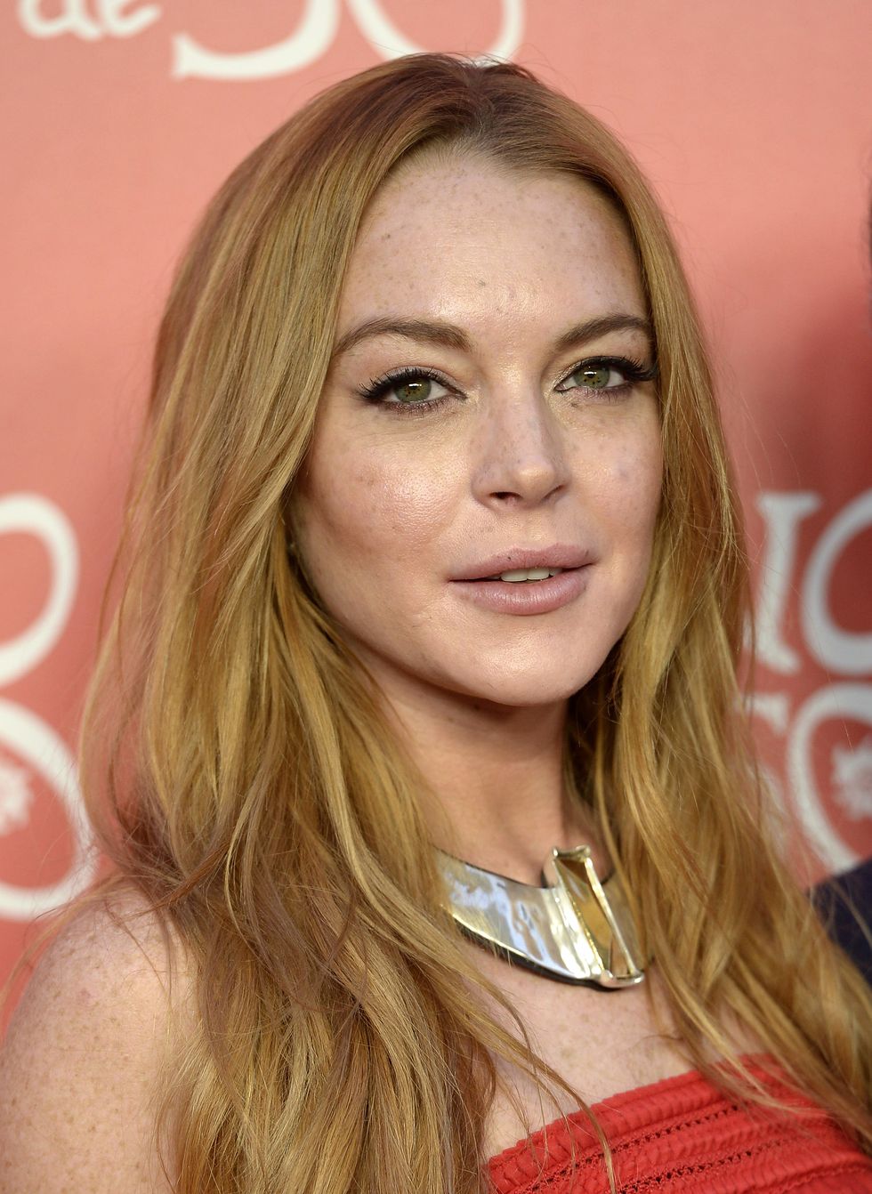 Lindsay Lohan on red carpet | ELLE UK