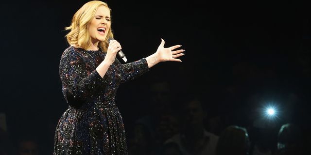 Adele performs at the Barclaycard Arena | ELLE UK