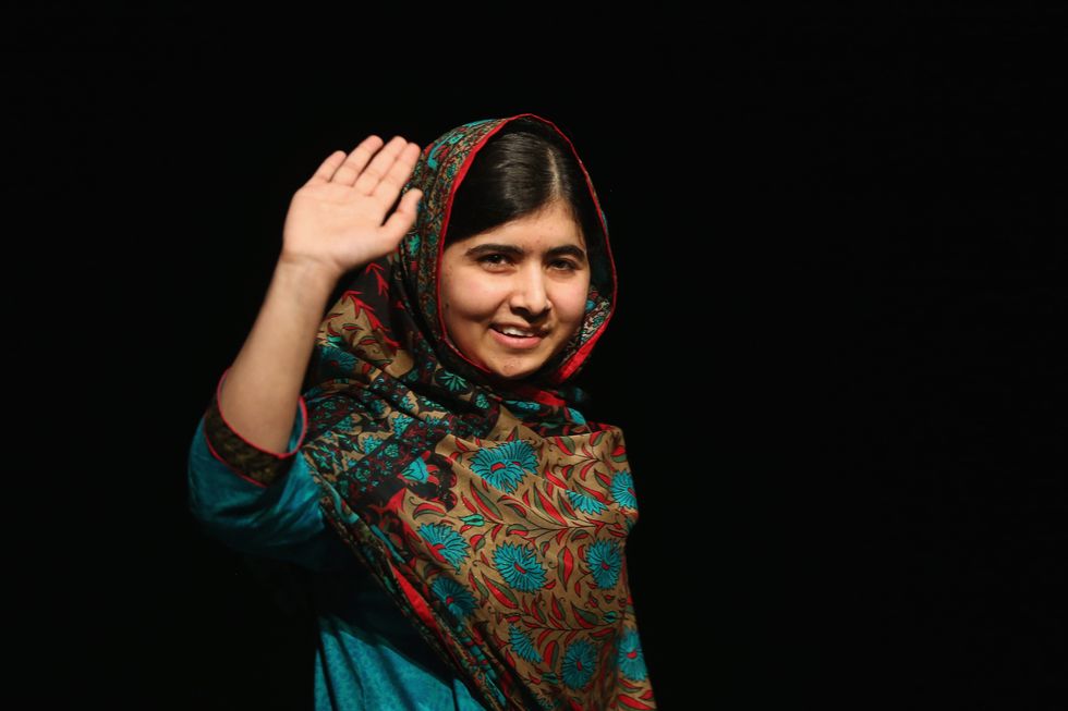 Malala Yousafzai waves at audience | ELLE UK