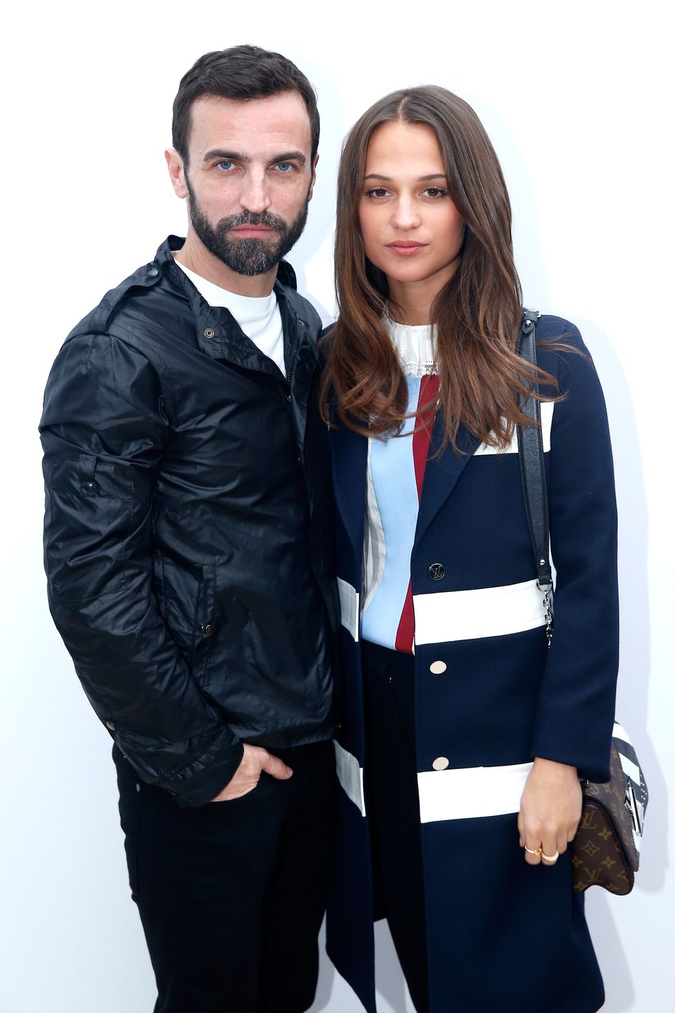 Emma Chamberlain and Stylist Nicolas Ghesquiere pose after the