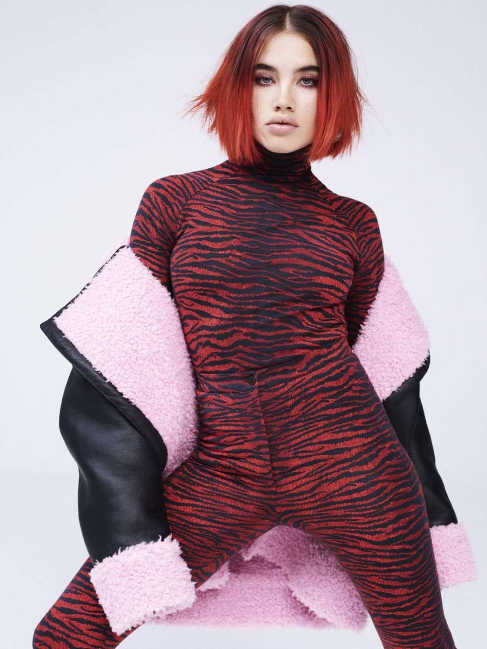 Lip, Sleeve, Shoulder, Red, Fashion model, Red hair, Fashion, Costume accessory, Model, Waist, 