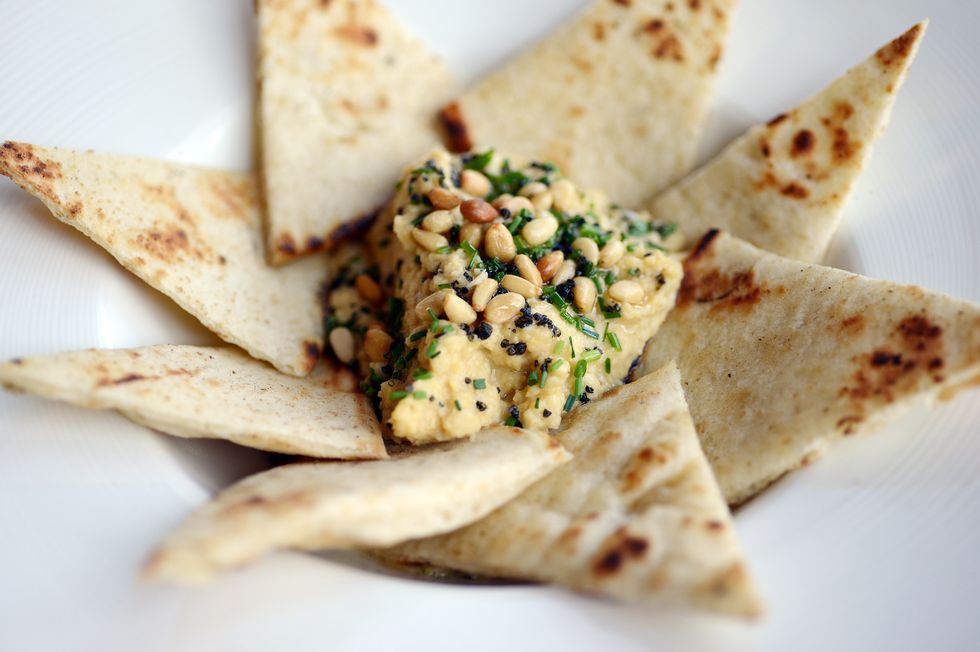 Hummus and pitta in a bowl | ELLE UK