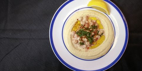 Hummus and lemon on plate | ELLE UK