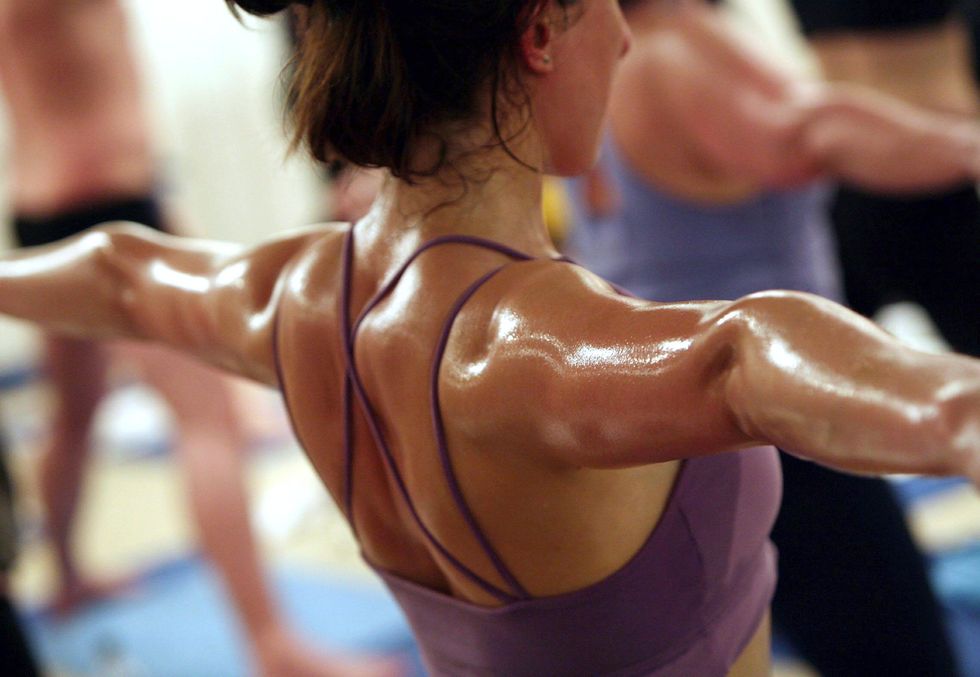 Woman exercising in gym | ELLE UK