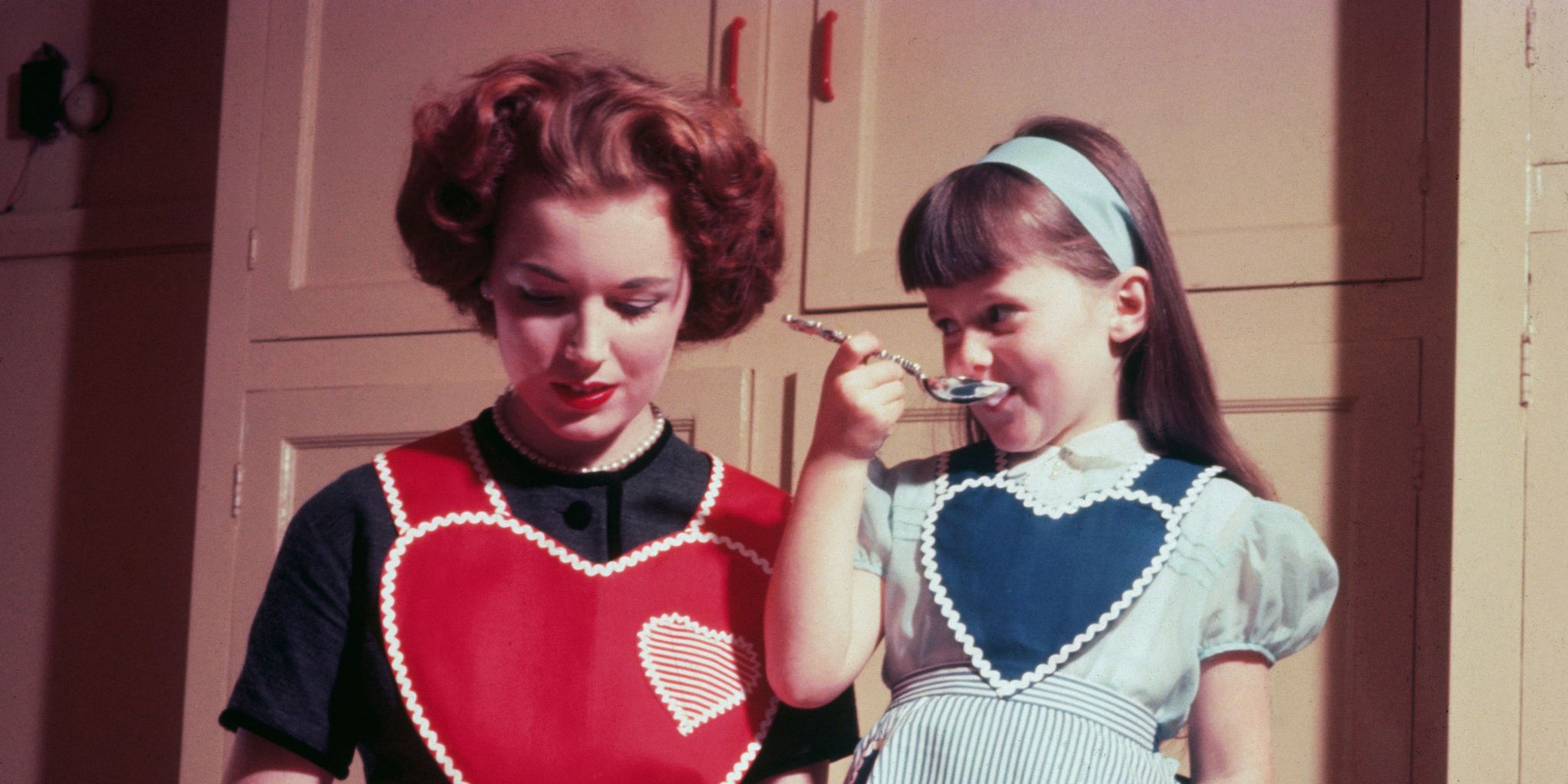 Mother and daughter eating | ELLE UK