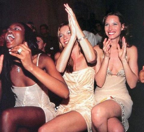 Supermodels laughing and clapping