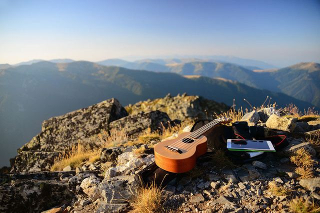 Guitar and iPad on mountain top