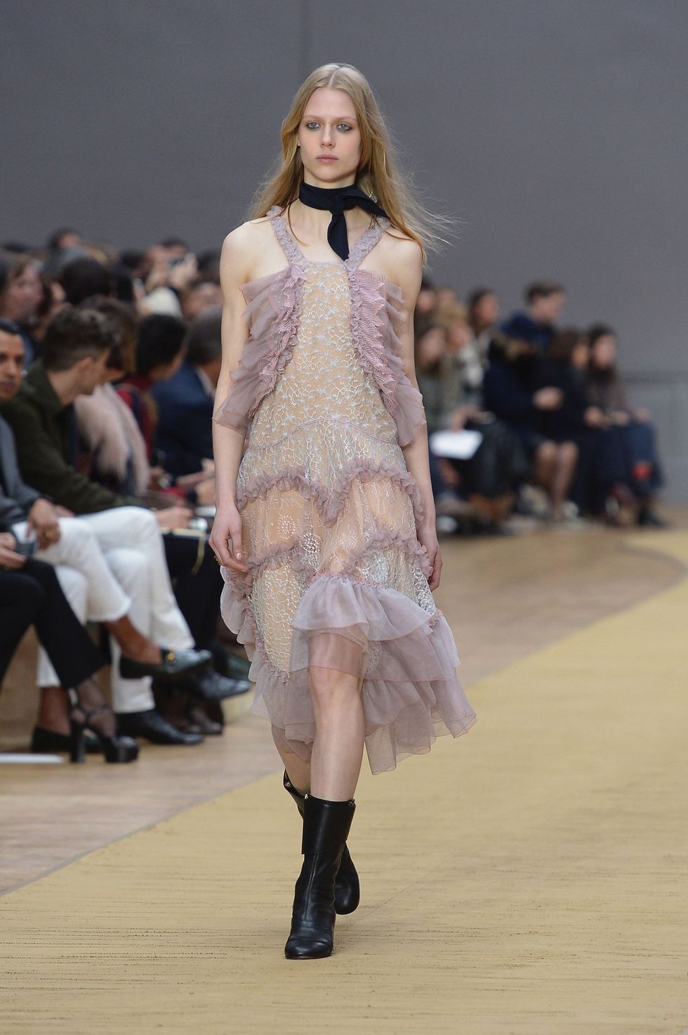 <p>Who would have thought it, pure girly frills in lilac and peach are literally the best combination. Like Karl, black accessories keep it from getting too Sandra Dee. </p>