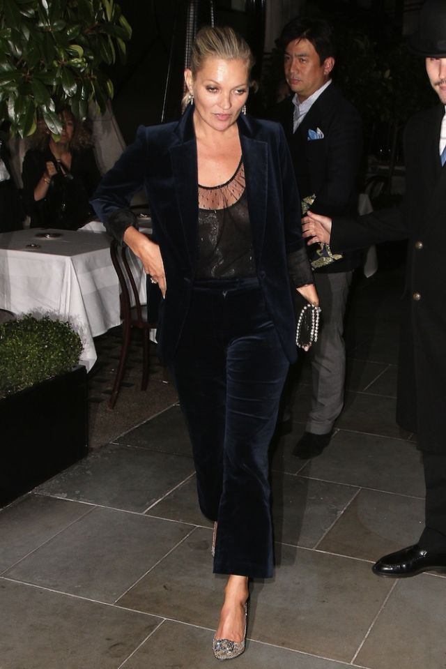 Kate Moss wearing a velvet suit