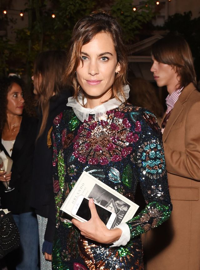Alexa Chung with her copy of 'Oralndo'
