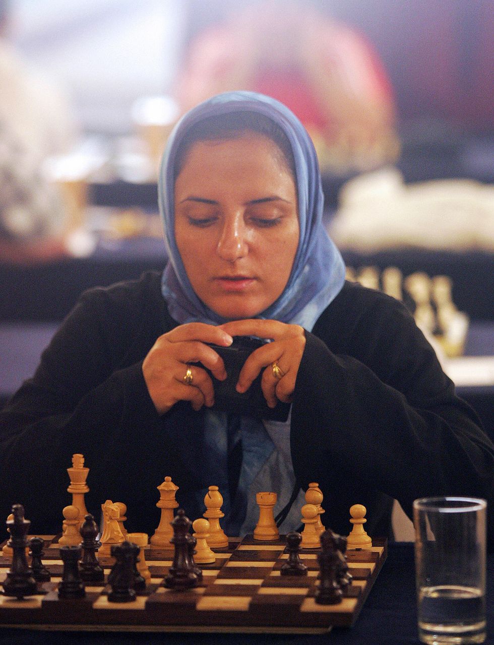 Iranian woman playing chess | ELLE UK
