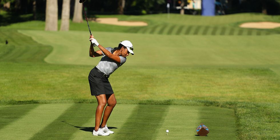 Former Secretary of State Condoleezza Rice playing golf