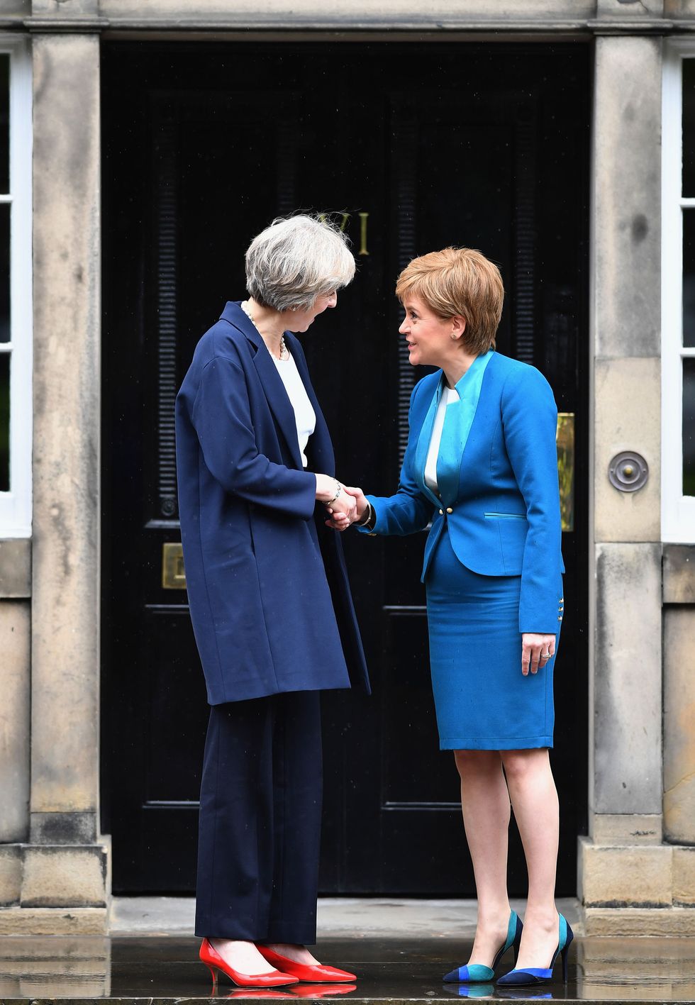 Theresa May and Nicola Sturgeon on the steps on Bute House